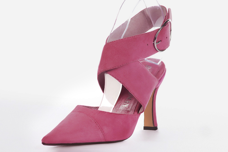 Shocking pink women's open back shoes, with crossed straps. Pointed toe. Very high spool heels. Front view - Florence KOOIJMAN